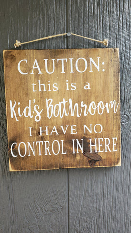 Caution:  This is a kids bathroom.  I have no contol in here.  wood sign