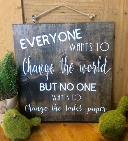 Everyone wants to change the world... Wood sign